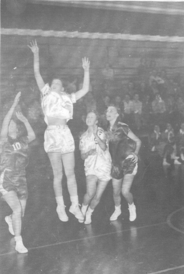 Marge playing basketball.