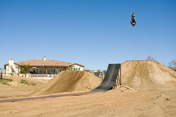brian deegan doing a one handed backflip (vitalmx.com)