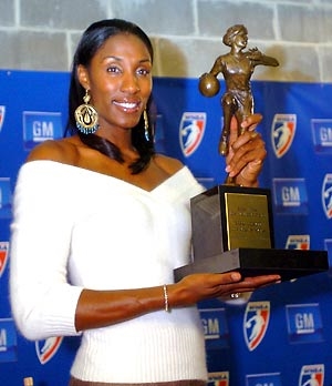Lisa Leslie holding her WNBA MVP award in 2001. (www.sportsillustrated.com)
