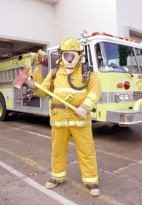 A firefighter and his equipment (http://en.wikivisual.com/index.php/Firefighter)