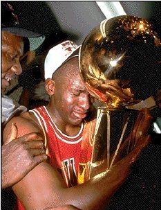 Michael Jordan with Championship Trophy (mbadiversity.com)