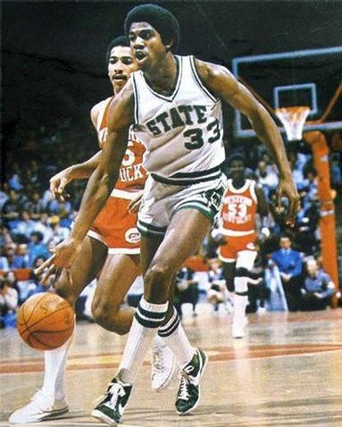 Magic Johnson playing long ago (http://artfiles.art.com/images/-/Magic-Johnson-Photograph-C10105939.jpeg)