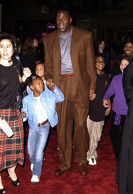 Magic Johnson with his children (http://l.yimg.com/eur.yimg.com/xp/premiere_photo/20050905/22/2740913496.jpg)