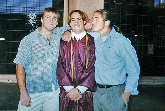 Patrick at ASU graduation with his two brothers. (http://thewe.cc/thewei/_/images_2/us_soldier/pat_tillman_two_brothers.jpe)