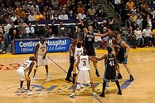 Bryant (second from left) looks on while Memphis  (by galapagar)