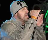 Chris Daughtry singing at a concert