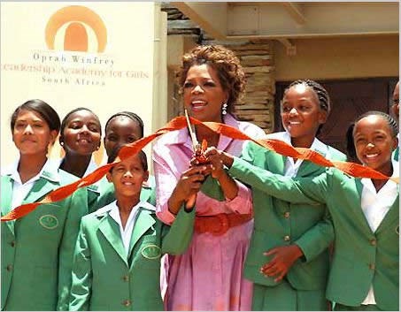 Oprah cutting rope (http://www.thatblackgirlsite.com/wp-content/uploadfiles/oprah-school-in-south-africa.jpg )