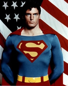Christopher as superman. (http://blog.newsok.com/nerdage/files/2008/12/christopher-reeve-superman.jpg)