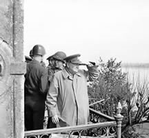 Shows looking over the river at the war zone (http://www.winstonchurchill.org/learn/biography/the-war-leader)
