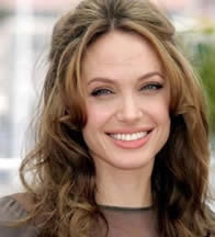 This is Jolie in a photo shoot. (http://cm1.theinsider.com/media/0/47/41/an.0.0.0x0.321x354.jpeg)