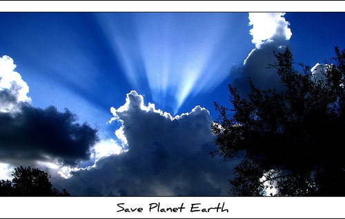 The sun shining through the clouds represents the (http://farm4.static.flickr.com/3326/3631634093_1970f3cc87.jpg)