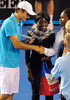 Roger Federer meeting citizens of the earthquake  (Google Images)