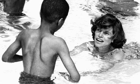 Shriver helping a child swim (http://static.guim.co.uk/sys-images/Guardian/Pix/pictures/2009/8/11/1250000914730/Eunice-Kennedy-Shriver-001.jpg)