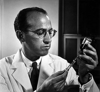 Salk with his vaccine. (http://2.bp.blogspot.com/_93yxiAXcKgg/SBOenfI_fOI/AAAAAAAAAMc/PE1TCKogAQM/s400/Jonas+Salk.jpg)