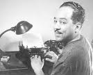 Langston Hughes typing a poem