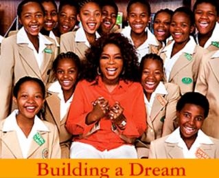 Oprah and Children (http://woodenspears.com/wp-content/uploads/2009/04/the-leadership-academy-for-girls.jpg)