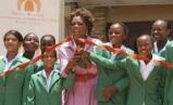Cut the ribbon to the new school (http://i.telegraph.co.uk/)