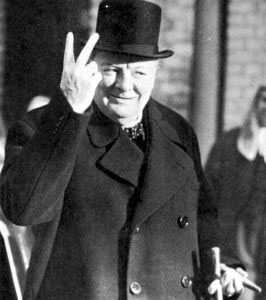Winston Churchill waving his famous (http://libcom.org/blog/the-peccadillos-winston-churchill-12082008)
