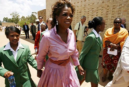 Oprah at her school for underprivileged girls. (http://img.dailymail.co.uk/i/pix/2007/01/OprahWinfreyEPA_450x302.jpg)