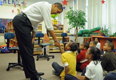 Obama motivating children. (Photo By: Cheryl Montgomery)