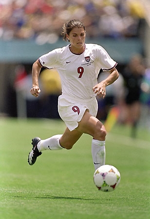 Mia Hamm dribbling down the field  (http://ripleyms.jack.k12.wv.us/2011%20Students/Kristin%20M/Personal%20Web%20Page.htm#sports)