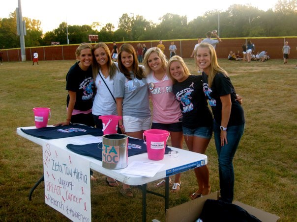 Sophmore girls canning at a football game