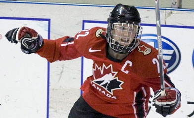 Haley scoring a goal in a game (http://www.cbc.ca/sports/hockey/story/2008/07/22/wickenheiser-sweden.html)