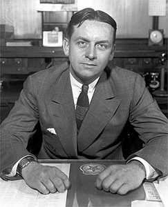 Eliot Ness sits behind his desk at the Prohibitio ((Photo by Hulton Archive/Getty Images) )
