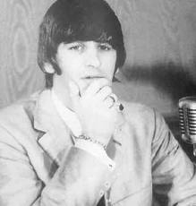 ringo in front of a microphone (fanpop.com)