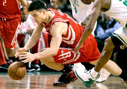Yao Ming hustling for a loose ball (http://olympics.scmp.com/Article.aspx?id=2083&section=athletes)