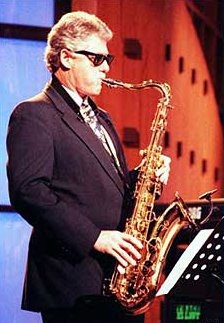 Clinton playing sax (http://wolcottwheeler2.blogspot.com/)