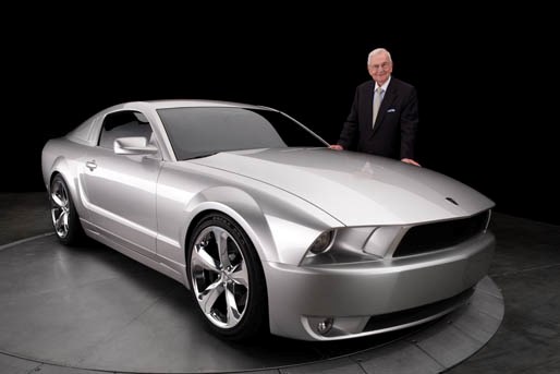 Lee Iaccoca standing next to the Lee Iacocca Mustang (http://dubdaily.com/wp-content/uploads/2009/06/mr-iacocca-and-mustang-small.jpg)
