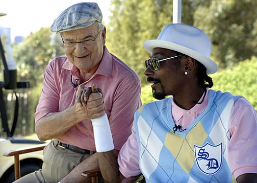Lee Iacocca and Snoop Dog on set for a commercial (http://cache.gawker.com/assets/images/jalopnik/2009/05/Word_is_Bond.jpg)
