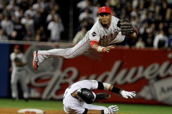 This is Erick Aybar turning a double-play. (http://bleacherreport.com/articles/353765-2010-mlb-predictions-breaking-down-the-best-in-the-al-west-by-position#/articles/353765-2010-mlb-predictions-breaking-down-the-best-in-the-al-west-by-position/page/6)