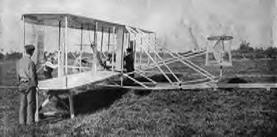 The Wright Brothers preparing for flight. (http://www.gravitywarpdrive.com/Wright_Brothers.htm)