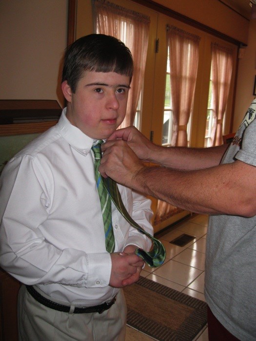 This is my brother John-John (This picture was taken when he was getting ready for his confirmation)