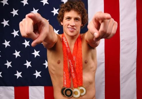 Ryan Lochte showing off his medals. (google.com)