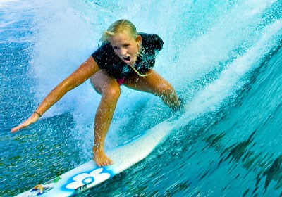 Bethany rides a wicked curl (http://realsportsheroes.com/bethany-hamilton/)