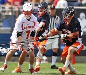 Bray Malphrus takes the ball from a Cornell player (The News and Advance (AP).)