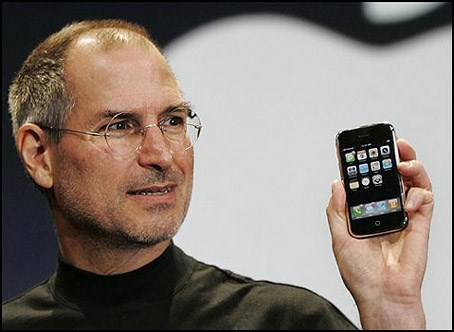 Steve Jobs holding an iPhone ( ())
