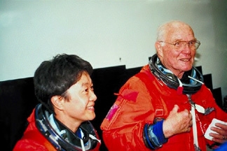 Chiaki with John Glenn.  NASDA photo from Spaceboy.Nasda  Photo library