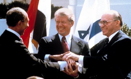 Carter with Begin and Sadat (http://www.findingdulcinea.com/news/on-this-day/March/Sadat-and-Begin-Sign-Israel-Egypt-Peace-Treaty.html)