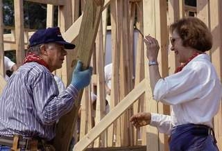 Mr. and Mrs. Carter building houses (http://www.history.com/photos/jimmy-carter/photo15)