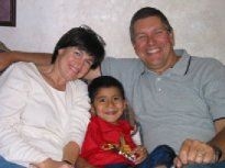 Melinda and Clark with an orphan (http://www.forhischildren-ecuador.org/fhcmain.php?pg=08)