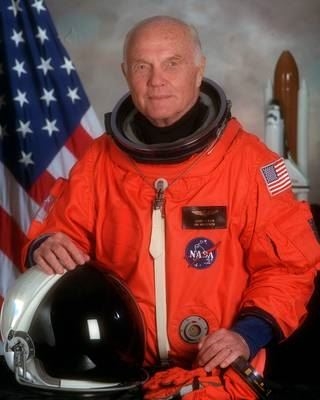 John Glenn in his spacesuit at 77 years old (https://www.nasa.gov/centers/glenn/about/bios/shut (NASA))