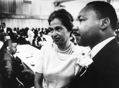 She is with Martin Luther King Junior (In the net (Wikipedia))