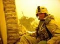 Paul siting posing in a picture in Iraq (www.ajc.com/.../news/ stories/0405/irmedal.html)