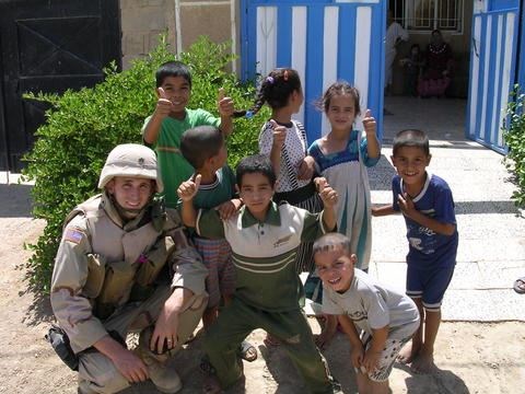 Joe with The Iraq Kids He Met  (Amy Irwin)