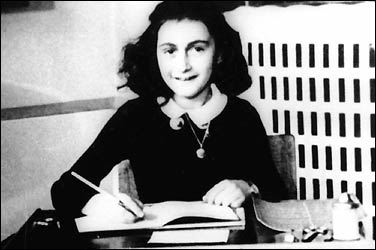 Anne Frank at her desk. (http://i.timeinc.net/time/time100/images)