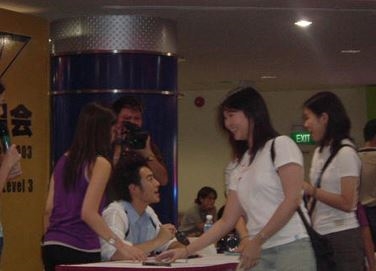 With his fans in autograph session